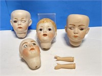 4 Porcelain Doll Heads and 1 Set of Arms