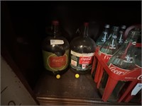 TWO ONE GALLON COKE SYRUP BOTTLES