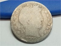 OF) 1909 silver Barber half dollar
