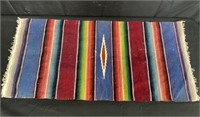 Small Mexican saltillo-style rug, 31" x 15”