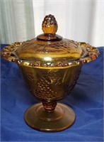 Amber colored compote with lid approx 5 inches