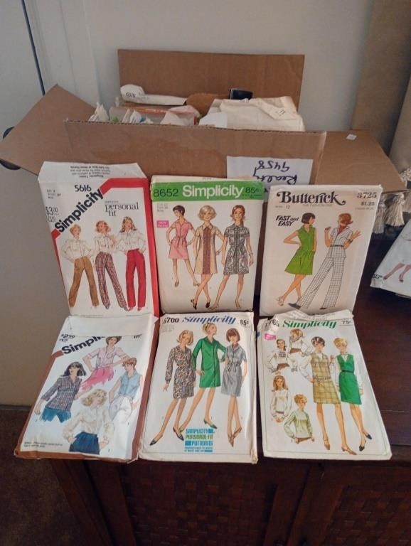 Box of vintage sewing patterns