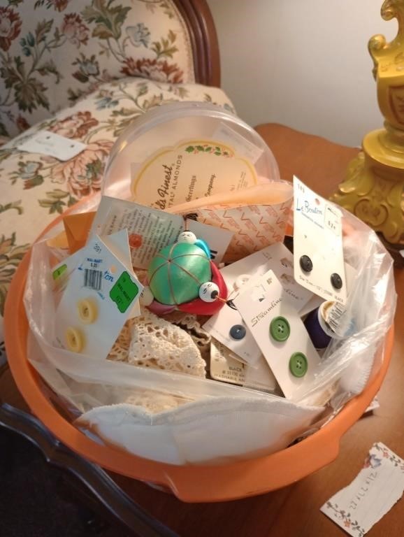 Basket full of buttons and sewing notions