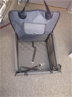 New dog car seat  comes with potty pads to put