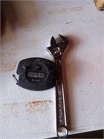 Crescent wrench and tape measure