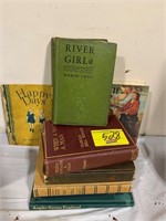 STACK OF ANTIQUE BOOKS