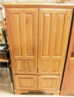 Lot #571 - Contemporary Oak four door storage