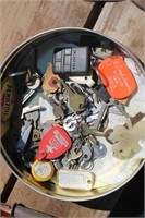 COOKIE TIN FILLED WITH OLD KEYS AND MISC