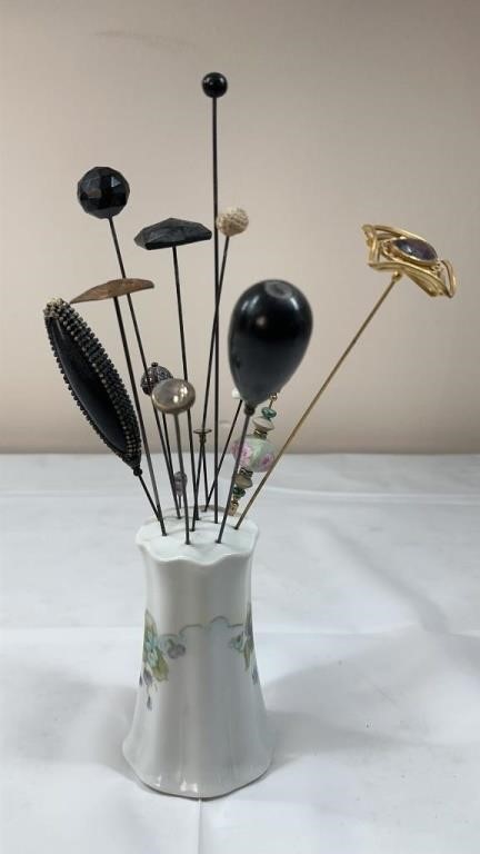 Antique hat pins and holder