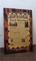 Wood Sign with Newspaper Clipping