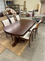 solid cherry table, 6 chairs with leafs