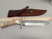 Damascus steel knife, antler handle appears