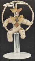 PRESSED COTTON CLOWN ON TRAPEZE RING