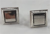 Square silver in color cufflinks