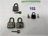 4 old locks with keys