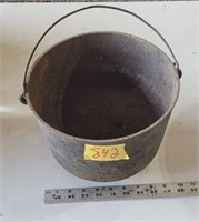 Cast iron pot with handle, flower pot, has holes