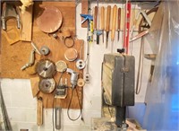 Woodworking Tools & Saw Blades Hanging on Wall