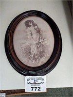 Vintage print in oval frame