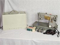 Singer 328K Sewing Machine with attachments