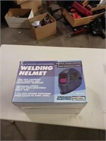 New in box solar powered welding helmet