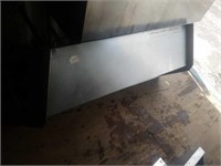 Stainless steel dishwasher over Shelf