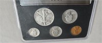World War II era coin sets in cases.  Dates are