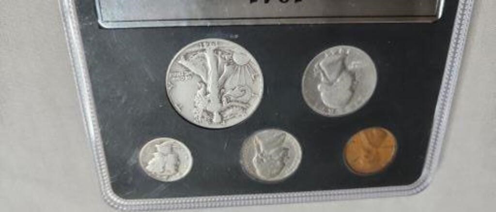 World War II era coin sets in cases.  Dates are