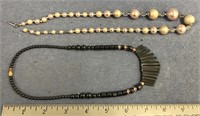 Lot of 2 necklaces, one is faux pearl and the othe