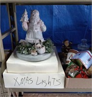 Shelf of Christmas Decorations, Santa Statue,