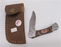 Hand made Damascus steel folding knife with wood