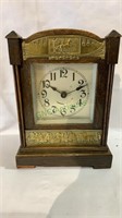 Antique table clock, in a Oak case with applied