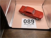 Vintage red Ford Mustang, plastic model promo