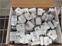 Box of USB wall chargers for cellphone