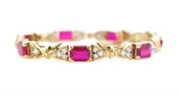 Created gemstone set yellow gold bracelet