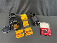 Assortment of Camera Lenses and Accessories