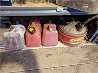 Bottom Shelf, 4 Various Gas Cans