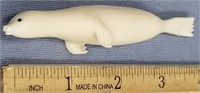 4.25" extremely well done ivory carving of a swimm