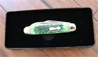 Green handle Schrade pocket knife in case