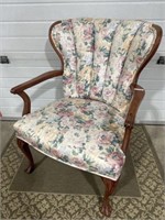 Antique thin back, upholstered chair, claw feet