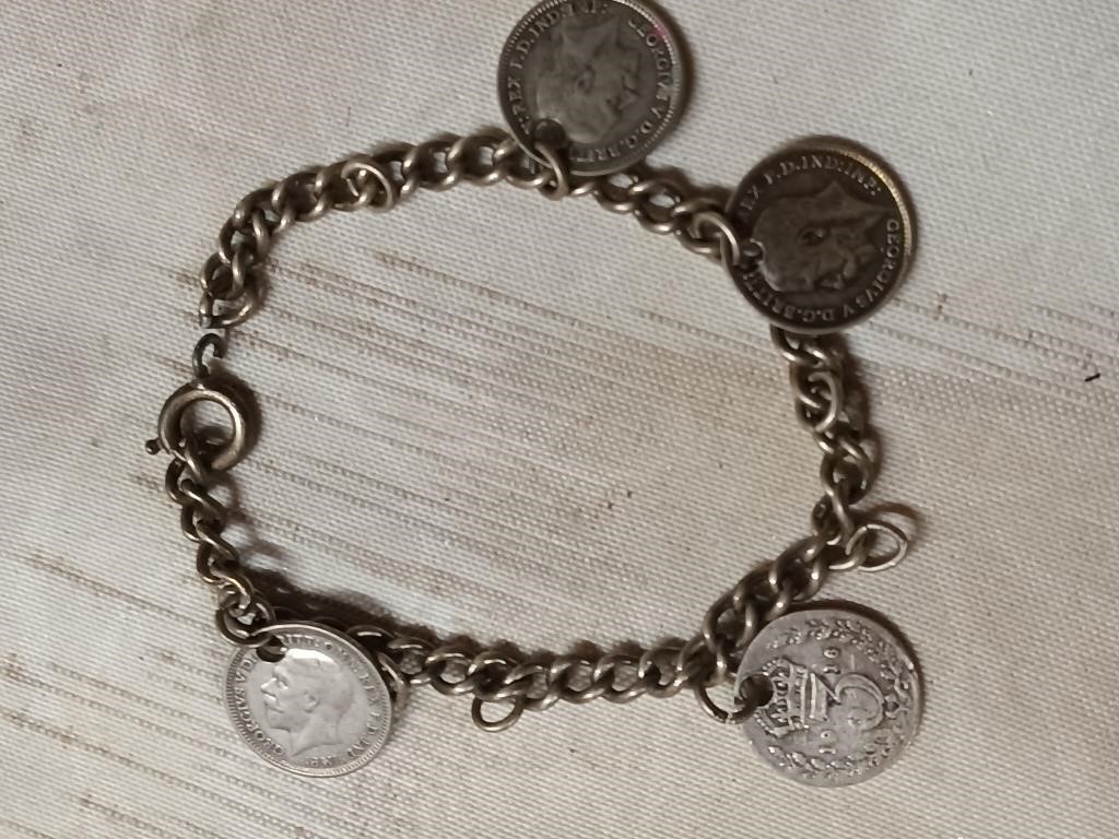 King George silver four  3 pence charm bracelet