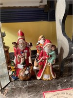 4 Ceramic Santas