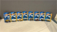 8 miscellaneous hot wheels new on cards.