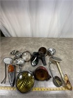 Assortment of motorcycle headlamps, lights and