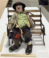 Porcelain hobo clown doll w/ wooden bench