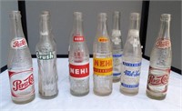 9 Vintage bottles - Pepsi, Nehi, Crush, Mil-Ky