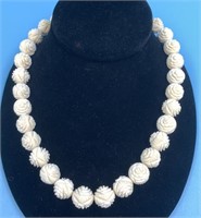 Hand carved beaded necklace carved from bone, thre
