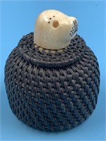 Small lidded baleen basket by Carl Hank, with ivor