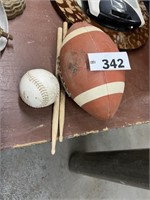 FOOTBALL, BASEBALL AND DRUM STICKS