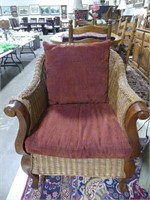 WICKER FRAMED PADDED ARM CHAIR