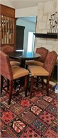 Round dinning table with four chairs